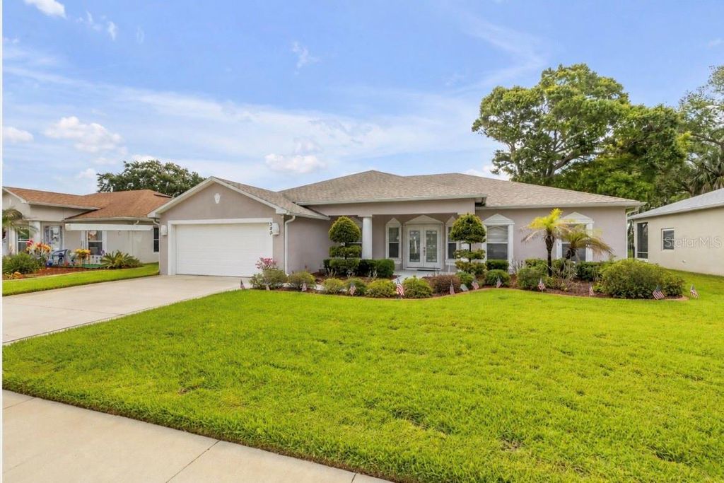 Photo of 349 Mariners Gate Drive, Edgewater, FL 32141 (MLS # NS1088340)