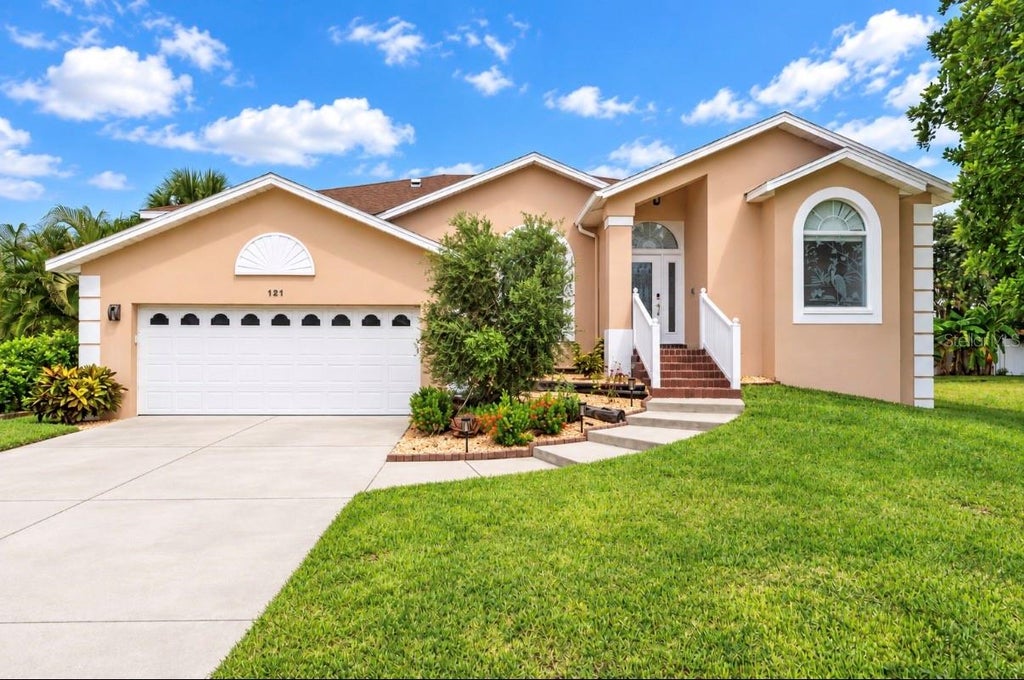 Photo of 121 7th Street, Belleair Beach, FL 33786 (MLS # TB8556261)