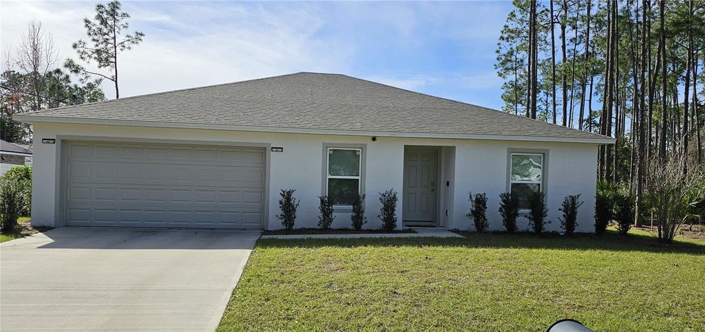 Photo of 32 Ramrock Lane, Palm Coast, FL 32164 (MLS # O6370814)