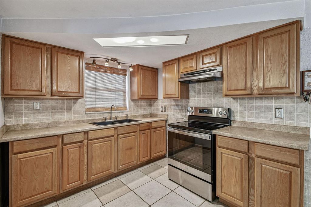 Photo of 1042 Saxon Lane, Holiday, FL 34691 (MLS # W7878369)