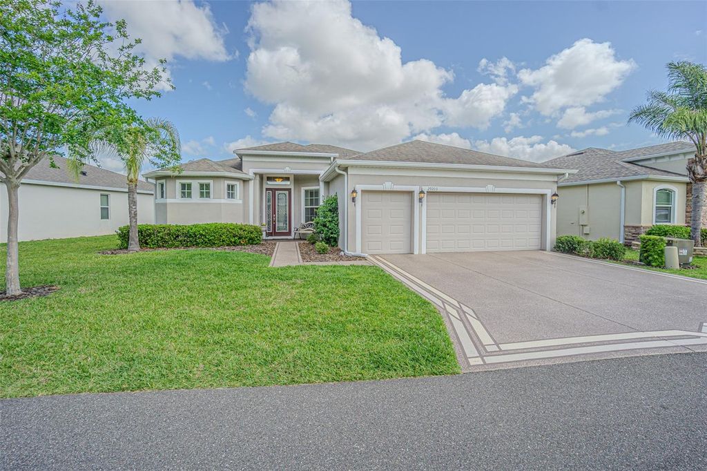 Photo of 29203 Grass Bunker Drive, San Antonio, FL 33576 (MLS # TB8488553)