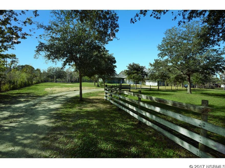 Custom block 3 bed 2 bath home on 5 pristine acres.  First parcel is 3.8 acres and the second is 1.25 acres. Property is cleared, fenced and cross fenced for animals.  Mature trees and landscape make this property look like a park.  Multiple out buildings include a 36x28 metal barn with 3 10' tall garage doors, a 21'x18' shed with lean to, a 28'x21' metal carport with 9' sides, and ample space for parking or storage.  This home lives much larger than the square footage shows because of the open floor plan, 10' walls, 6' windows, and 8' French doors.  This quality home also offers wood floors, wood cabinets, cathedral ceiling, and recessed lighting.  Don't miss the opportunity to view this beautiful property!