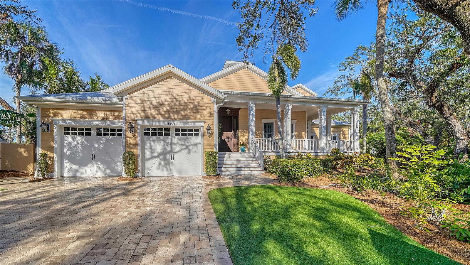 Majestic waterfront home nestled in one of Siesta Key's most exclusive neighborhoods. Prime waterfront location with direct access to the inter-coastal (no bridges) and features a 16,000 pound vertical lift and a jet ski lift. This Waterfront home features wraparound decks on multiple levels composed of Brazilian Ipe decking, wood ceilings, a private grill area with a dramatic view up the canal and a resort like swimming pool and spa featuring a rock waterfall and paver patio to fill your sun filled afternoons. Upon entering the home, you will see the amount of detail and craftsmanship that was put into this home. Hand-scraped wood flooring, coffered tongue-n-groove ceilings, huge baseboard and crown molding throughout. Expansive windows let the natural light in and an aquarium glass wall in the kitchen/family room
overlooks your lower deck, swimming pool, spa and water view. The home has well over 6000 square feet of living area with the master suite occupying the first-floor level. This home affords 6 bedrooms, 5 full baths, 2 half baths, a private office with built-in cabinetry, 2 wet bars one on each level, 2 laundries with one on each level, a Sports room/ man cave with a built-in entertainment center. Upstairs has 4 bedrooms, two of which are suites, a second family room/playroom, theater/entertainment room which connects to your second level deck.
The main level of the home incorporates your kitchen, family room, pantry, wet bar, dining room, private office, master suite and laundry. The kitchen features a huge walk-in pantry with entry door, a huge center island with a granite top, Subzero refrigerator, a Wolf 6 burner/griddle stove, a Wolf warming drawer, a Wolf microwave, 2 drawer Fisher Paykel dishwasher and a second Miele dishwasher for all your entertainment needs. Each level has a wet bar with the lower level having a subzero wine refrigerator and a drink refrigerator and the upstairs level has a Fisher Paykel dishwasher, an ice-maker, microwave, and a refrigerator. For the car enthusiast you have two 2 car garages with separate drives which provides additional parking as well. This spectacular home is hard to match, and you won't be disappointed. The home has an elevation of 15 feet and also has a home generator to provide comfort and a sense of security during any power outages that may occur. Schedule an appointment to see your future home!