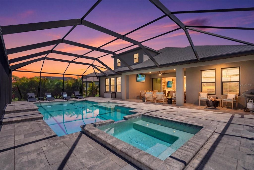 Photo of 9293 Tequila Sunrise Drive, Sarasota, FL 34241 (MLS # A4691812)