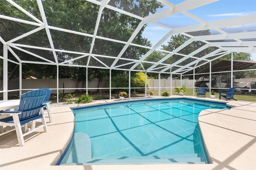 Welcome to this beautifully updated 3-bedroom, 2-bathroom pool home in Southeast Ocala's highly desirable Windstream community. Situated on a spacious corner lot just 3 miles from historic downtown, this turn-key property perfectly blends convenience and Florida living. Step inside to find a bright split-bedroom floor plan featuring engineered hardwood floors, a cozy fireplace, and a stunning, freshly renovated eat-in kitchen complete with quartz countertops and stainless appliances. The primary suite offers a peaceful retreat with a walk-in closet and pool views, while the enclosed sunroom provides the perfect spot to overlook your private, screen-enclosed pool. Outside, the fully fenced yard features dual driveways and covered storage ideal for your boat or RV. Best of all, you will enjoy ultimate peace of mind with a brand-new AC installed in 2025 and a roof replaced in 2020. This home is ready for its next chapter, schedule your showing today!

Ocala Fiber cable services the home for lightning speed internet.