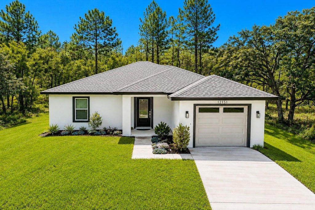 Photo of 12151 Sora Avenue, Brooksville, FL 34614 (MLS # TB8542940)