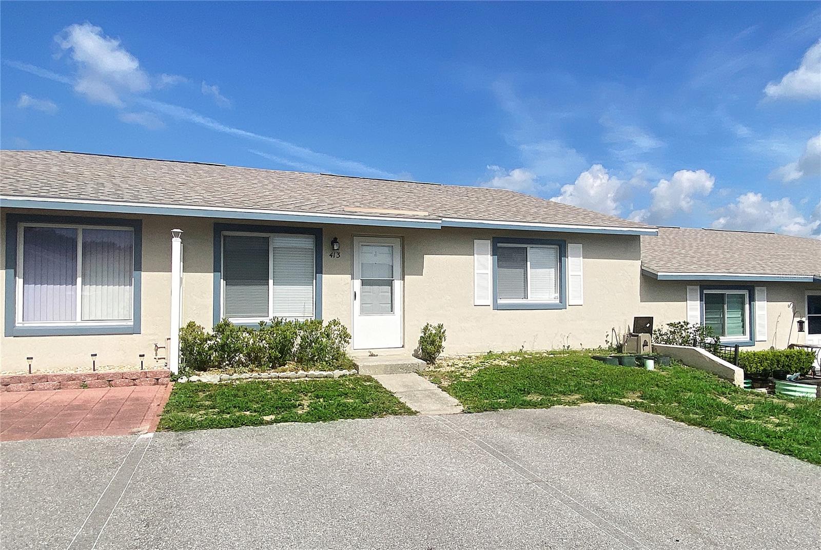 Welcome to Winter Ridge, a desirable waterfront condominium community offering access to Lake Smart, part of the beautiful Winter Haven Chain of Lakes. This 2-bedroom, 2-bath unit features a spacious open floor plan with ceramic tile throughout, a large pantry/utility room, and convenient in-unit laundry hookups (washer and dryer not included). Enjoy relaxing on the oversized screened lanai, and take advantage of the assigned parking. The galley-style kitchen comes fully equipped with a refrigerator, range, microwave, and dishwasher. Community amenities include a swimming pool, clubhouse, shuffleboard courts, and a fishing/boat dock for lakefront enjoyment. Conveniently located near shopping and medical facilities. Please note: No smoking or vaping permitted. Lawn care is provided, but tenants are responsible for maintaining the landscaping.
