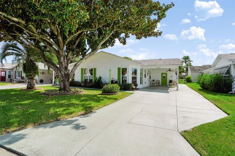 Photo of 1220 Maria Court, Lady Lake, FL 32159 (MLS # TB8559909)