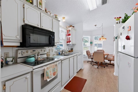Tiny photo for 1220 Maria Court, Lady Lake, FL 32159 (MLS # TB8559909)