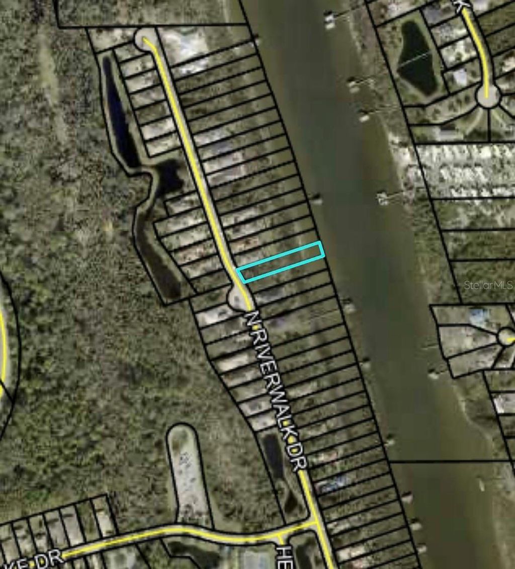 Photo of 38 N Riverwalk Drive, Palm Coast, FL 32137 (MLS # FC315550)