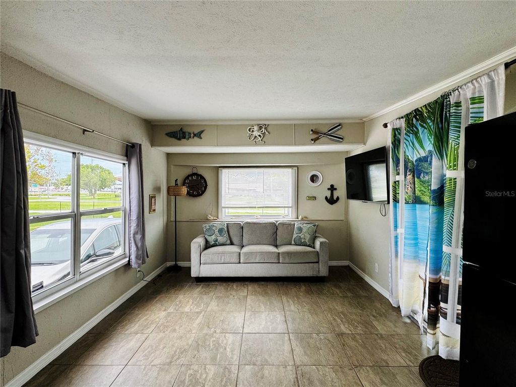 Photo of 6905 Signal Cove Drive, Hudson, FL 34667 (MLS # TB8418628)