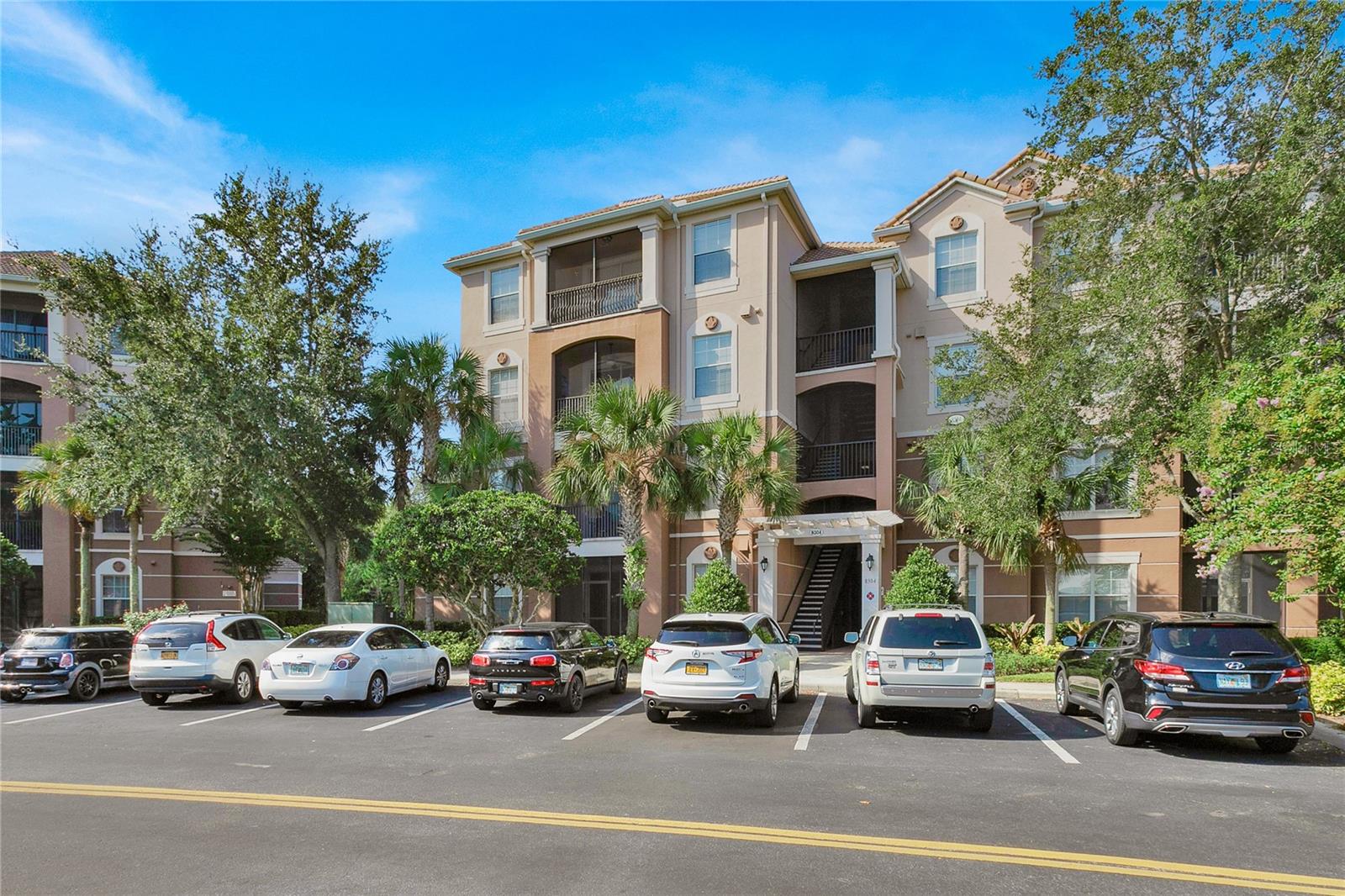This ground floor 3 bedroom condo is available for rent! This property is in the gated Bella Trae community with many amenities. The rent includes basic cable, basic internet, pest control and water. The split floorplan allows for extra privacy in the bedrooms and the primary bedroom has a walk in closet. There is an enclosed lanai for you to sit and relax in, and a full size washer and dryer. The community of Bella Trae has a stunning clubhouse that includes a state-of-the-art gym, fitness studio, zero-entry pool, media room, billiards room, bocce ball court, a putting green, social activities for all, and much more. No corporate vehicles allowed, there is one covered parking space included. Interested parties will need to apply through the HOA as well as they have a strict 35-day approval process. This property is tenant occupied until mid-October.
