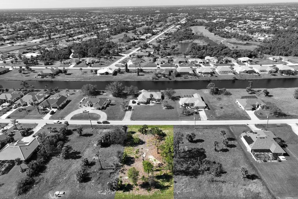 Photo of 837 Boundary Boulevard, Rotonda West, FL 33947 (MLS # D6138723)