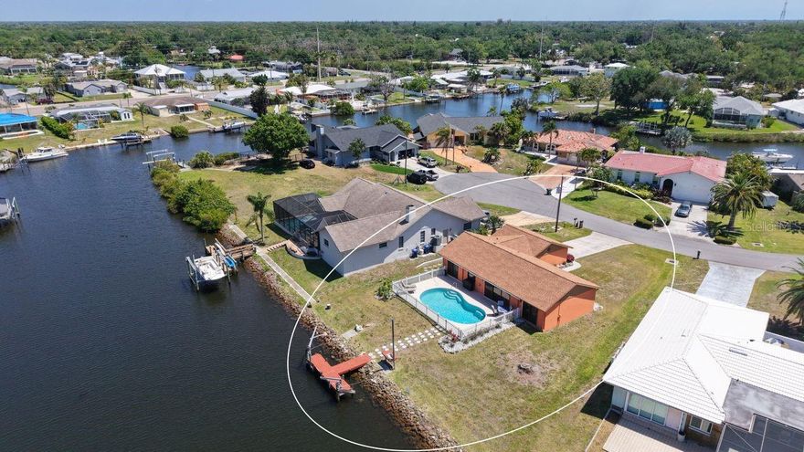 Tucked at the end of a QUIET CUL-DE-SAC, where traffic fades and the only real noise is the water, this WATERFRONT HOME WITH GULF ACCESS delivers the kind of setting people come to Florida hoping to find. Step inside and it immediately feels easy… FRESHLY PAINTED, LIGHT-FILLED, and METICULOUSLY KEPT, with a layout that flows naturally from everyday living to relaxed evenings at home. The kitchen is both functional and inviting with GRANITE COUNTERTOPS and a TILE BACKSPLASH, while both bathrooms have been FULLY REMODELED, giving the home a clean, updated feel where the work has already been done. Major upgrades including a NEW ROOF (JUNE 2024 WITH TRANSFERABLE WARRANTY), NEW GARAGE DOOR, NEW HVAC 2026, NEW SUBMERSIBLE WELL PUMP 2026, POOL HEATER, REFRIGERATOR, WASHER AND DRYER mean less to worry about and more time to enjoy this TURN-KEY home. Out back is where this home separates itself. The HEATED POOL overlooks the water with OPEN VIEWS THAT STRETCH OUT AND HOLD YOUR ATTENTION, whether it’s morning coffee, an afternoon swim, or winding down as the sky changes at sunset. With DIRECT GULF ACCESS, the water isn’t just a view… it’s part of your day. Boat out, explore, or simply enjoy the stillness right from your own backyard. With NO HOA, you have the freedom to truly make it your own, without restrictions getting in the way of how you want to live. When you’re ready to head out, you’re just minutes from the shoreline… Nokomis Beach and Venice Beach are roughly 11–15 minutes away, making it easy to go from home to sand, water, and sunset whenever you feel like it. Local restaurants, waterfront spots, and everyday conveniences are all close enough to keep life simple without giving up the calm this location offers. This is the kind of place where the pace slows down, the views stay with you, and the FLORIDA WATERFRONT LIFESTYLE actually feels real… not just something you visit.