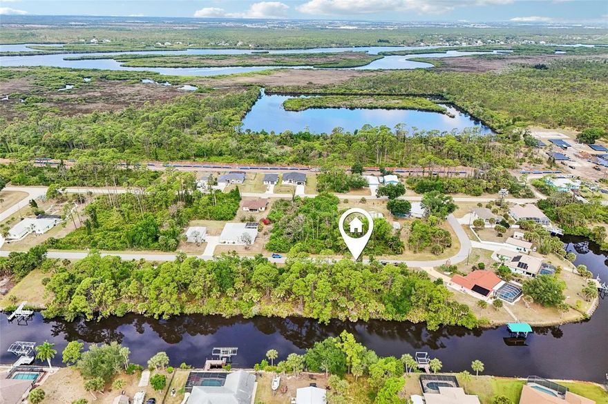 ***Build Your Saltwater Escape***
Discover the perfect canvas for your dream home on this prime saltwater (80 ft) frontage lot. Situated on the serene Cheshire Waterway, you’ll enjoy seamless boat access to the expansive Myakka River and beyond! Located in a peaceful, up-and-coming neighborhood, this location offers the rare balance of quiet coastal living with quick proximity to the best of North Port and Port Charlotte.

Whether you’re heading to the Charlotte Sports Complex, hitting the Gulf beaches, or enjoying the shops at Cocoplum, everything is within reach. Bring your builder and start planning your waterfront legacy today.