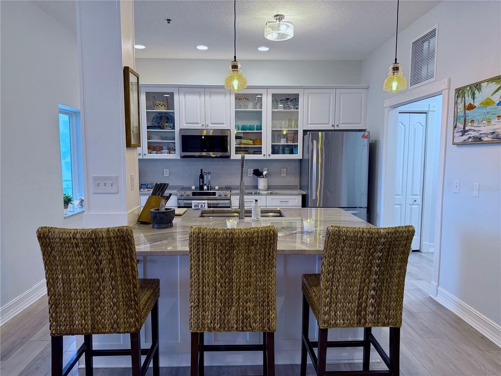 Photo of 423 S Atlantic Avenue #102, New Smyrna Beach, FL 32169 (MLS # NS1085987)