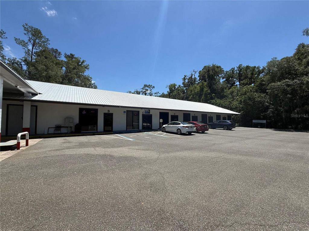 Photo of 3380 SE Lake Weir Avenue #E, Ocala, FL 34471 (MLS # OM724356)
