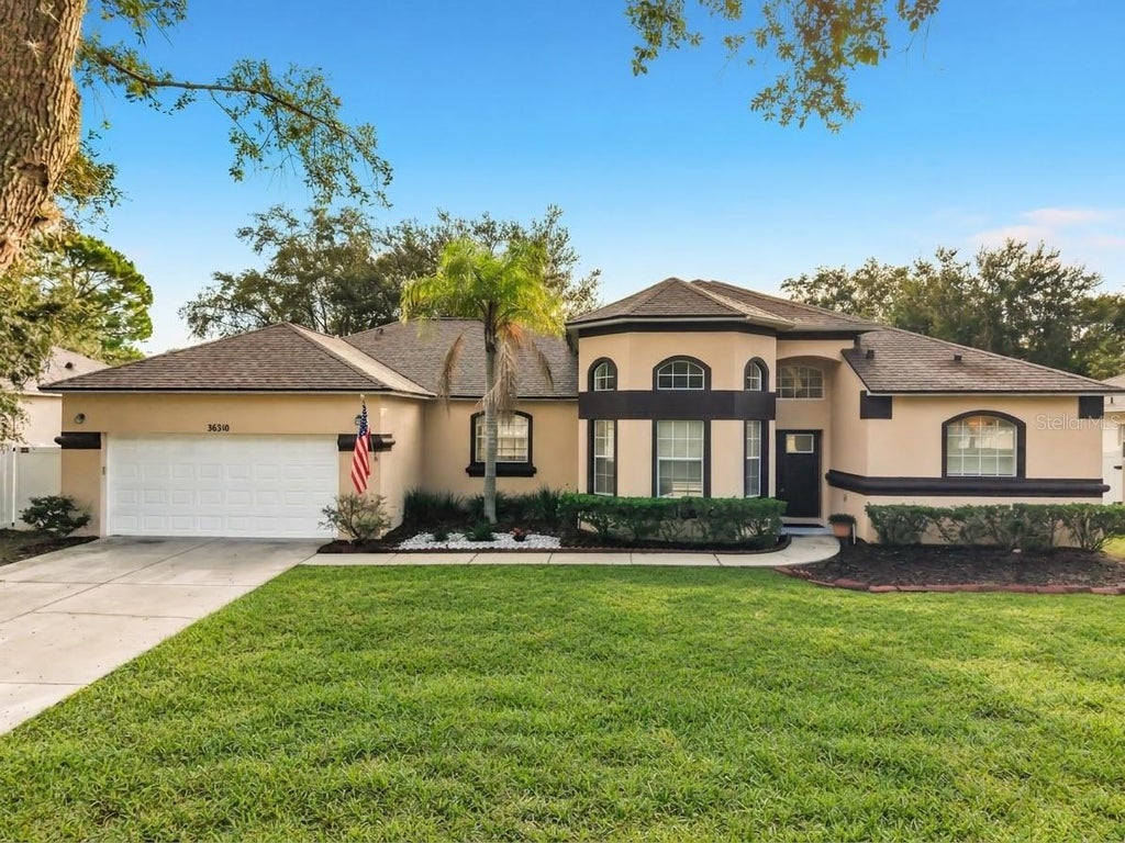 Photo of 36310 Cavalier Ct, Grand Island, FL 32735 (MLS # G5118873)
