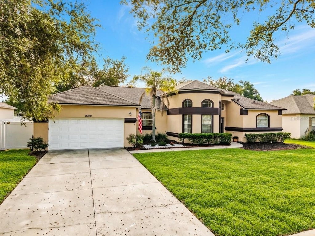Photo of 36310 Cavalier Ct, Grand Island, FL 32735 (MLS # G5118873)