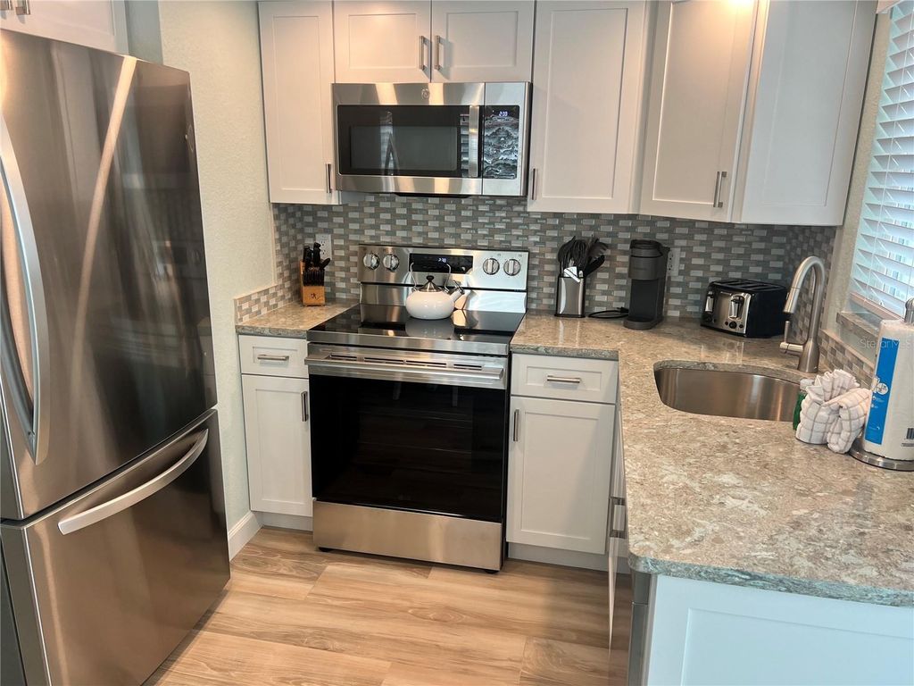 Photo of 6154 Midnight Pass Road #D16, Sarasota, FL 34242 (MLS # TB8468516)