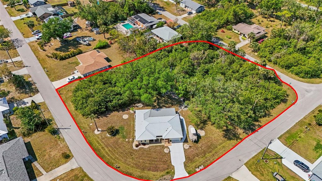 Photo of 18399 Burkholder Circle, Port Charlotte, FL 33948 (MLS # C7513235)