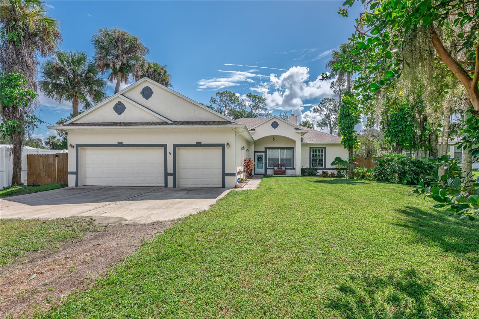 Experience the Ultimate Outdoor Paradise!
If you love the outdoors, gardening, or simply relaxing by the water, this home is your dream come true. Cast a line from your private Trex dock, take your boat out to explore Lake Harney and the majestic St. Johns River, or gather around the firepit for marshmallow roasts under the stars.
This property features a fully fenced yard—perfect for pets or play—and a custom chicken coop, offering the opportunity to collect fresh eggs each morning. Whether you’re looking for added privacy, a safe space for little ones, or a touch of homestead living, this outdoor space has it all.
Step inside and prepare to be impressed by this completely remodeled custom home. Luxury vinyl plank flooring flows throughout, while the open island kitchen is a chef’s delight, featuring shaker-style wood cabinets with soft-close drawers, gleaming granite countertops, and an incredible four pantries—two walk-in and two closet style—for unmatched storage only found in a custom home. The oversized laundry room adds even more convenience with an additional storage closet.
Recent upgrades provide peace of mind, including a new roof (2021), newer four-zone A/C system, and a new septic system (2024). The thoughtful split floor plan is perfect for entertaining, with a cozy wood-burning fireplace and large windows that bring the outdoors in. Relax on not one, but two expansive screened porches, or unwind in the hot tub just off the primary suite.
Additional highlights include an oversized three-car garage with epoxy flooring, two storage sheds (one with power, water, and AC), and plenty of space to add a pool. All of this comes with the benefit of highly rated Seminole County schools nearby.
Don’t miss your chance to call this serene retreat your home—schedule your private showing today!