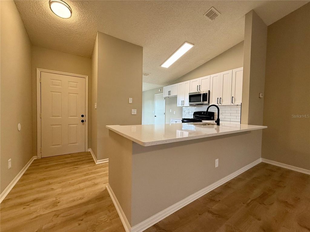 Photo of 5335 Hyde Park Avenue, Orlando, FL 32808 (MLS # O6376051)