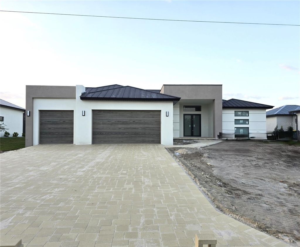 Photo of 16692 Liggett Circle, Port Charlotte, FL 33981 (MLS # D6143769)