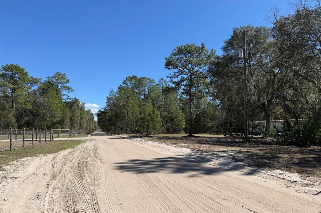 Photo of 10650 NE 210th Street, Fort Mccoy, FL 32134 (MLS # TB8500082)