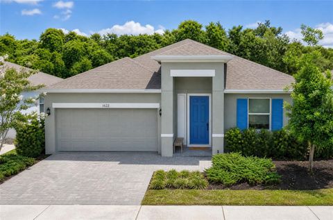 Photo of 1622 Way Of Peace Lane, Mascotte, FL 34753 (MLS # N6144186)