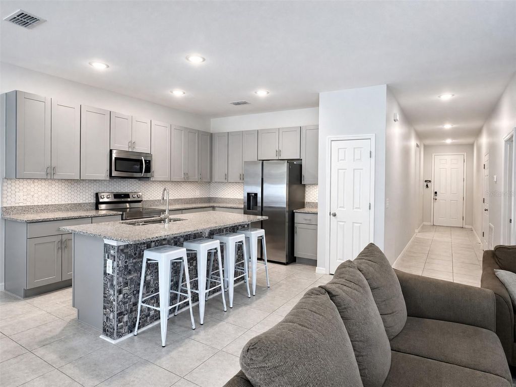 Photo of 1622 Way Of Peace Lane, Mascotte, FL 34753 (MLS # N6144186)