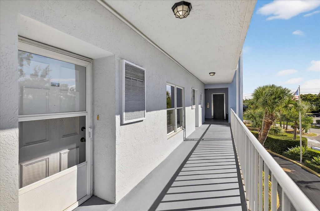 Photo of 4939 Floramar Terrace #302, New Port Richey, FL 34652 (MLS # W7880439)