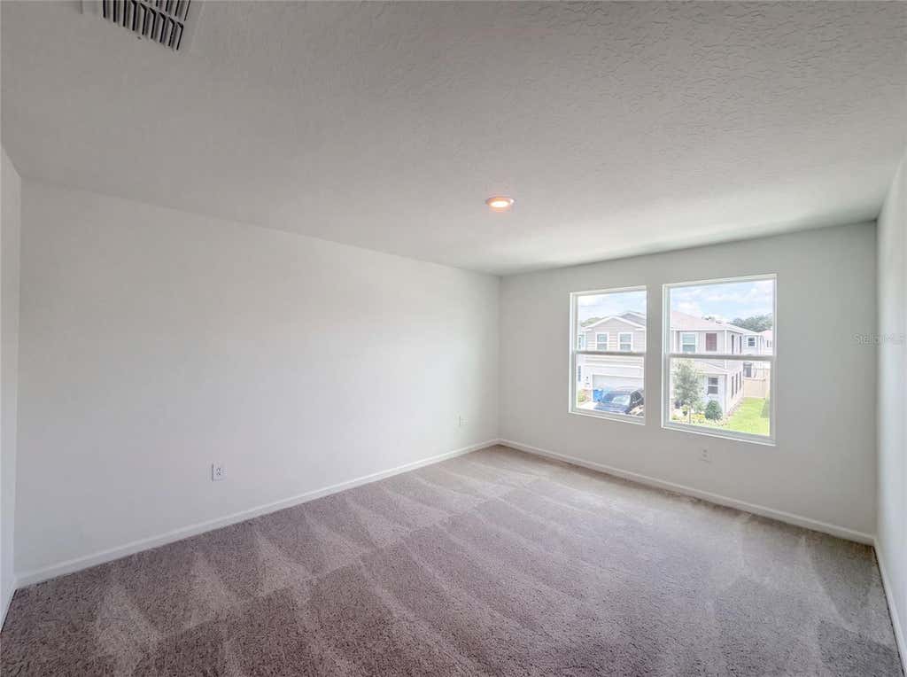 Photo of 4373 River Beacon Boulevard, Davenport, FL 33837 (MLS # O6434240)
