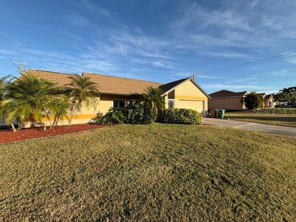 Photo of 5 SE 20th Place, Cape Coral, FL 33990 (MLS # O6378567)