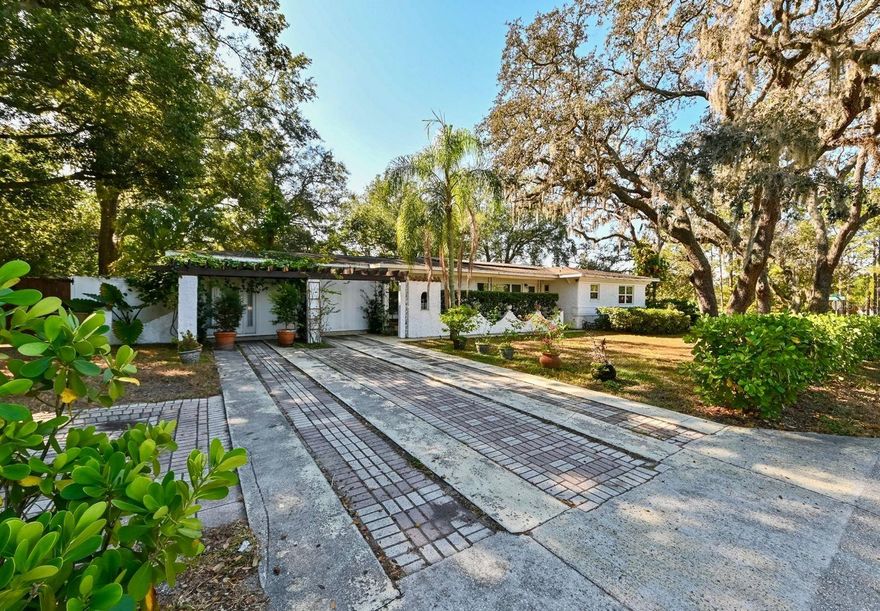 Discover this truly unique rental opportunity featuring a spacious main house and a charming independent cottage, both connected by a beautifully landscaped and serene backyard. Enjoy warm and elegant wood floors throughout, stunning gardens, and inviting outdoor spaces perfect for relaxing or entertaining. The home offers exceptional space and comfort, along with solar panels that significantly reduce electricity costs. Furniture can be included as an option, with a negotiable monthly rent depending on your needs.
Perfectly located just across the street from the TempleTerrace Golf & Country Club, and only minutes from Busch Gardens, USF, and a variety of shopping and dining options—including Starbucks just 5 minutes walking. 
This property is the only one in the area with 5 bedrooms and 3 full baths, it offers flexibility, privacy, and a peaceful atmosphere—an ideal place to call home.