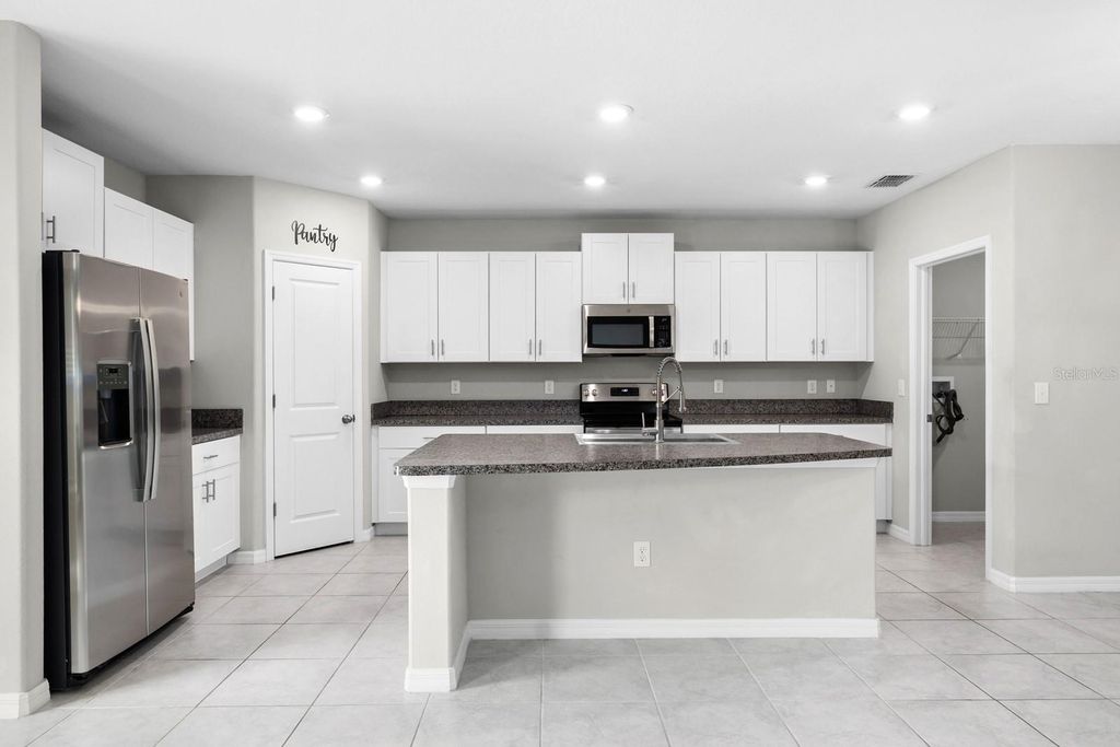 Photo of 7217 Ronnie Gardens Court, Tampa, FL 33619 (MLS # TB8492926)