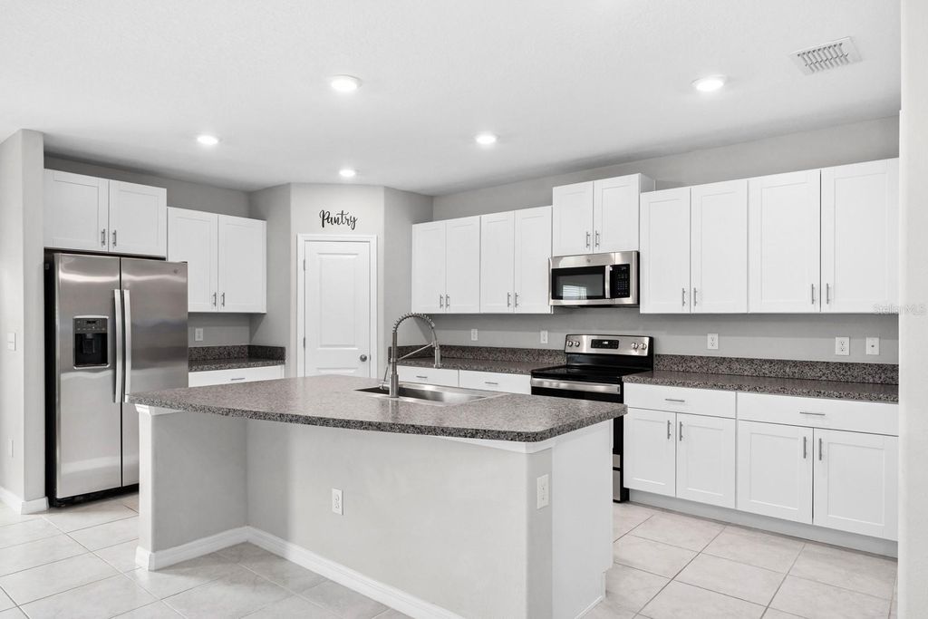 Photo of 7217 Ronnie Gardens Court, Tampa, FL 33619 (MLS # TB8492926)