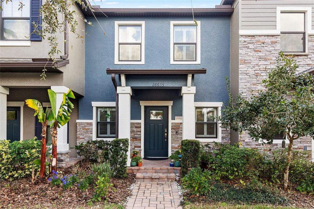 Photo of 28635 Tranquil Lake Circle, Wesley Chapel, FL 33543 (MLS # TB8347171)