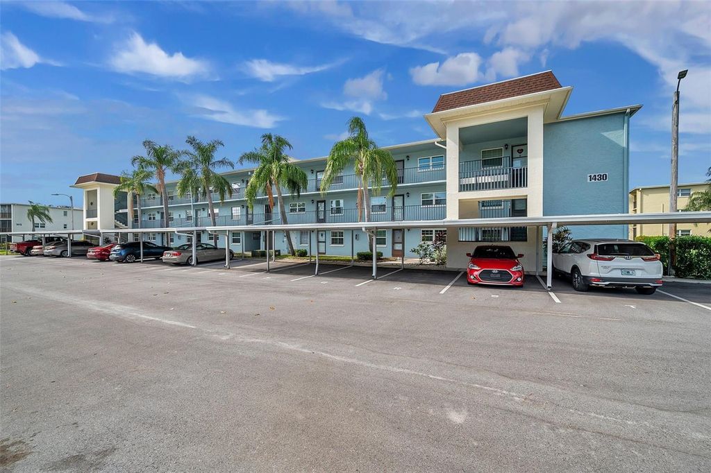 Photo of 1430 Heather Ridge Blvd #304, Dunedin, FL 34698 (MLS # TB8443064)