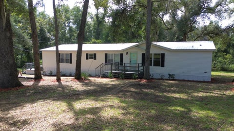 Photo of 3391 NW Bur Oak Place, Jennings, FL 32053 (MLS # O6439601)