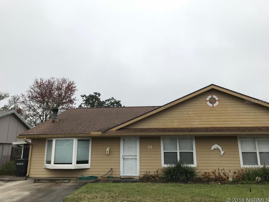 Snowbird alert, tired of moving around home to home year after year want the security of a place to call yours in a premier golf community - look no further - this Fairgreen home is ready for you First time home buyer - what a deal, home has newer roof, New air conditioning unit (HVAC) , hurricane windows, refrigerator and stove just a few years old and washer and dryer included. Beautiful terra cotta type tile in all living areas, large family room with fireplace. Master bedroom with ensuite bath. In addition there are two parking spaces in front of home and as a bonus the community pool membership certificate is included in the sale so you have access to community pool and clubhouse. Location Location =Optional membership to two golf courses Hidden Lakes or New Smyrna Beach Municipal Golf course ;Water: City