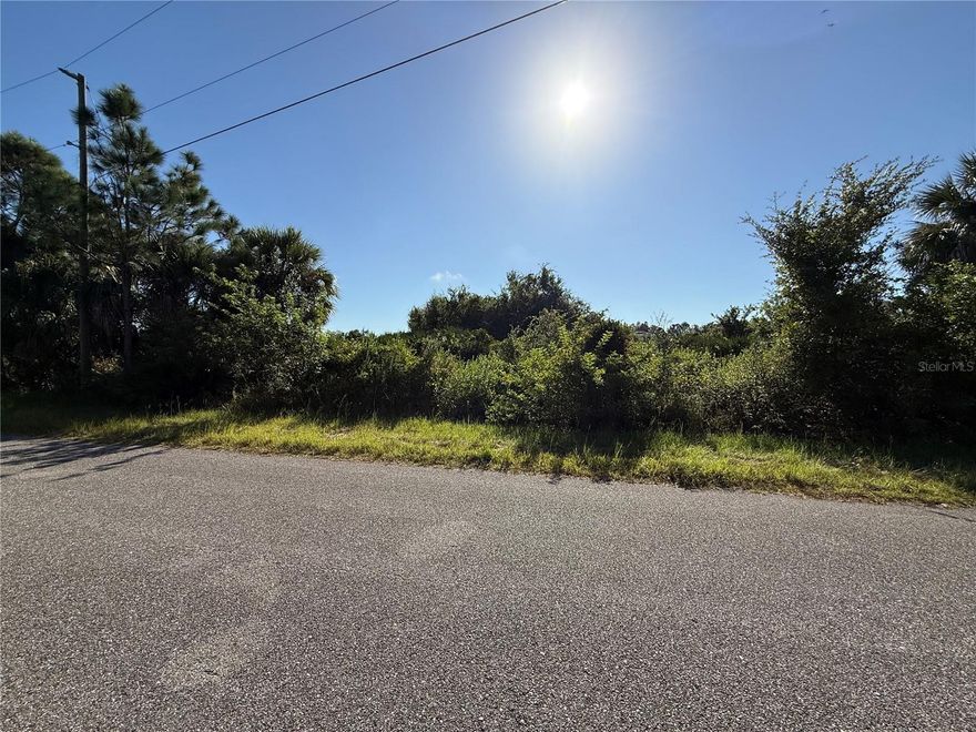 Looking for that perfect piece of land to build your slice of paradise on? Here's a great lot in this fabulous area of North Port! NO flood insurance required, save money and build with confidence!!! Electric pole at site! Bring all your toys...store your RV, boat, kayaks, put up a detached garage, shed for an art studio, trampoline, or treehouse, doesn't matter as this is a non-deed restricted area of Sarasota County! And of course, what could be more Florida than having your own pool which the property has plenty of room for! Property is close to all amenities including sandy beaches & crystal waters of Venice, Englewood & Boca Grande Beaches, Golf Courses, boat launches, minutes from TWO Spring training Stadiums, the Rays & the Braves who hosts games against the Yankees, Red Sox, Mets & more. Property is located in a Scrub Jay habitat identified area and has a mitigation fee of $3400 and regulations that a builder cannot clear the lot March 1 - June 30 of any year; the sales price is reflective of this future cost. Have local builder with floorplans of 3 bedroom 2 bathroom homes with 10’ ceilings, 8’ doors porcelain plank flooring throughout, Quartz/Granite, lighting & fans, appliances, Impact windows…all-inclusive pricing starting at $320,000.