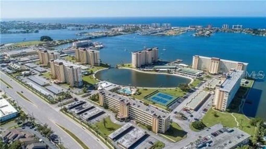 SEASONAL  LEASE.  Welcome to this stunning water view and waterfront gated community! Step into this gorgeous updated 4th floor  2 bed condo.  Just bring your toothbrush as this unit is completely  furnished.  Breathtaking views of the intercoastal.  The master suite features a generous  closet space and a full bath.  Warm and inviting living room overlooking lagoon and intracoatsal.  Fully remodeled kitchen with stone countertops.    Sea Towers is a 55+ community.  Round-the-clock guard gate security .Stay active with tennis, pickleball, two heated pools, shuffleboard, a fishing pier, a putting green, diverse monthly activities and a dedicated Social Director. For those seeking relaxation, indulge in the awe-inspiring sunsets from waterfront benches, connect with nature at the central lagoon, or host a gathering at the BBQ shelters. This prime location is a block walk to publix and  a short drive to Johns Pass, pristine local beaches,  shopping, several restaurants and Seminole mall.