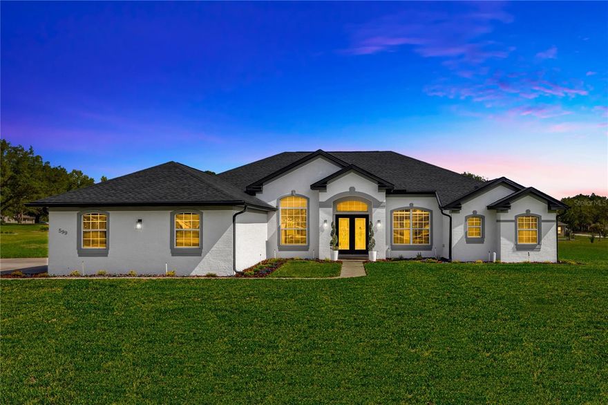 WORK RELOCATION SALE! NEW 2025 HVAC, 2025 WATER HEATER & 2022 ROOF!! Move-in ready 3-bed, 2.5-bath home on oversized 1-acre lot in beautiful Citrus Hills. This MUST SEE pristine residence offers 3,141 square feet of FULLY REMODELED living space boasting an open floor plan, vaulted ceilings, and luxury vinyl plank flooring. Meticulous attention to detail is presented in the RENOVATED KITCHEN with new quartz countertops, customized backsplash, 42” shaker-style cabinets, and brand-name appliances. The spa-inspired RENOVATED MASTER BATH is a true oasis featuring a frameless walk-in shower and soaking tub, with beautiful tile work throughout, custom double quartz-top vanities and matte fixtures. The home has a new roof (2022), new Carrier HVAC system with warranty (2025), and new water heater (2025). Gutters and complete irrigation system already installed. Located in a friendly and desirable community without the added expense of social membership fees!