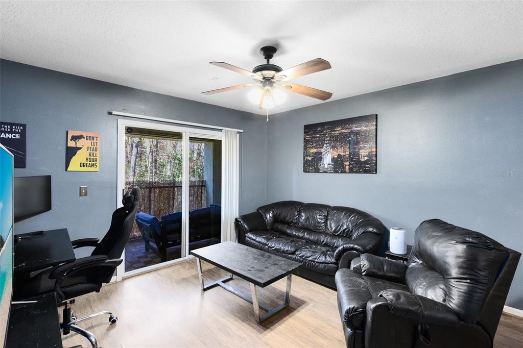 Photo of 802 Crest Pines Drive #824, Orlando, FL 32828 (MLS # O6378284)
