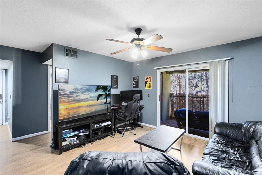 Photo of 802 Crest Pines Drive #824, Orlando, FL 32828 (MLS # O6378284)