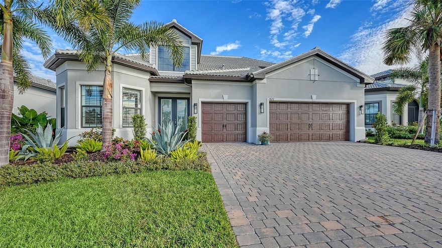 Nestled in the sought-after community of Lakewood Ranch Waterside, this exceptional two-story home offers a harmonious blend of comfort and functionality in a picturesque setting. The main floor features a thoughtfully designed great room floor plan with volume ceilings showcasing custom coffered details, along with a private office ideal for working from home. The kitchen is a centerpiece of style and efficiency, boasting a large center island with seating, quartz countertops, stainless steel appliances, a gas cooktop, and a spacious walk-in pantry. The primary suite is a private retreat, complete with a walk-in shower, private water closet, and an expansive custom-organized dressing room. Two additional bedrooms and bathrooms on the main floor provide ample space for family or guests. Upstairs, a generous bonus room, along with a fourth bedroom and full bath, creates an ideal space for visitors. Enjoy a private pool and outdoor kitchen, perfectly positioned to take in serene lake views and a rare backdrop of a prestigious polo farm, where the sight of grazing horses enhances the setting. Shoreview residents enjoy a wide array of amenities, including a fitness center, resort-style pool, tennis and pickleball courts, and more. Located just minutes to Waterside Place, with convenient access to Lakewood Main Street, University Town Center, downtown Sarasota, I-75, beaches, top-rated schools, and medical facilities.