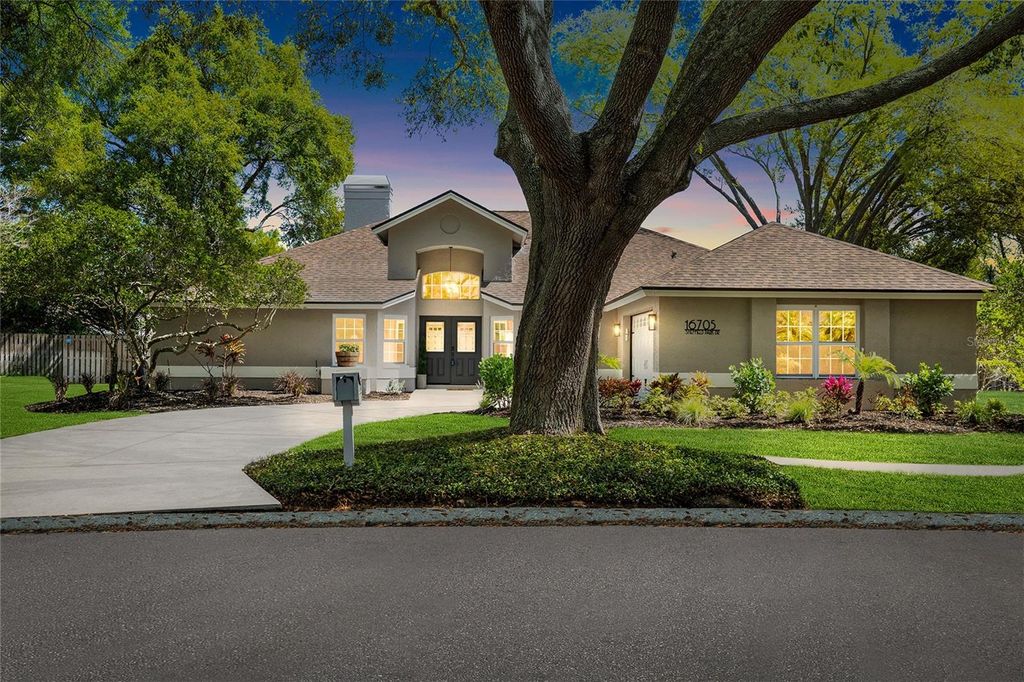 Photo of 16705 Sheffield Park Drive, Lutz, FL 33549 (MLS # TB8486194)