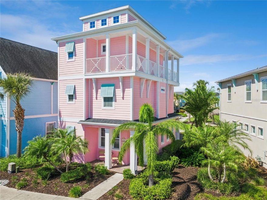 Welcome to this one-of-a-kind, fully furnished with unique coastal decor, 3-bedroom, 3.5-bath home in the highly sought after Margaritaville Resort Orlando. It is the perfect blend of luxury, comfort, and unforgettable full time or vacation living. 

Inside you'll find an inviting open-concept floor plan featuring a beautiful kitchen with an upgraded tile flooring and cabinets and a custom backsplash, seamlessly flowing into the dining and living areas with a 75" in TV or enjoy the tranquil park views and no rear neighbors on your 22x22 oversized patio. Ideal for entertaining or relaxing after a day at the parks. 

Each of the three spacious bedrooms have large flat screen TVs and their private ensuite bathrooms, providing comfort and privacy for owners and guests alike.

The primary suite is truly exceptional, boasting 14ft vaulted ceilings, an oversized bathroom, dual walk-in closets, and exclusive access to a wraparound third-story balcony—the perfect place to unwind while enjoying breathtaking views, including nightly Disney fireworks.

The oversized back patio really sets this home apart—the largest of its kind in Margaritaville. Designed for ultimate outdoor living, it is already equipped with electrical for a future hot tub and a retractable awning, giving you endless possibilities to create your own private oasis.

Whether you’re looking for a luxury vacation home, investment property, or personal retreat, this rare offering delivers the best of resort-style living just minutes from world-class attractions, dining, and entertainment