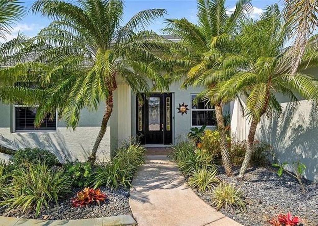 Photo of 265 White Marsh Lane, Rotonda West, FL 33947 (MLS # A4668893)